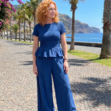 Eirenne | Conjunto de Top con Peplum y Pantalones de Pierna Ancha