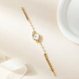Ana® - Reloj dorado con pulsera de perlas elegantes