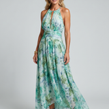 Portia | Vestido Midi Floral con Cuello Halter y Pliegues Suaves