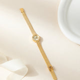 Iris® - Reloj dorado con pulsera trenzada
