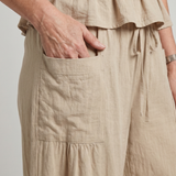 Eirenne | Conjunto de Top con Peplum y Pantalones de Pierna Ancha