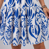 Cogent | Vestido de tirantes delgados con cuerpo fruncido y largo a la rodilla