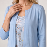 Celeste | Vestido midi sin mangas con chaqueta corta de estampado floral