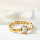 Lana® - Reloj dorado con cristales y pulsera entrelazada