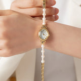 Ana® - Reloj dorado con pulsera de perlas elegantes