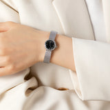 Iris® - Reloj dorado con pulsera trenzada