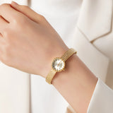 Iris® - Reloj dorado con pulsera trenzada
