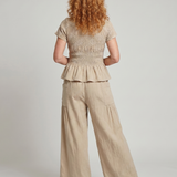 Eirenne | Conjunto de Top con Peplum y Pantalones de Pierna Ancha