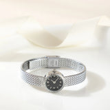 Iris® - Reloj dorado con pulsera trenzada