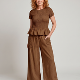 Eirenne | Conjunto de Top con Peplum y Pantalones de Pierna Ancha