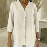 Adel | Blusa con escote en V y detalles de volantes