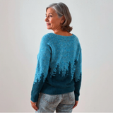 "Donna | Suéter Vintage de Islandia" can be rewritten as "Suéter Vintage Islandés Donna".